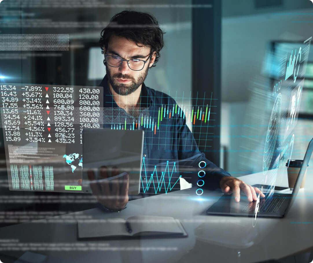 Man trading Forex on computer
